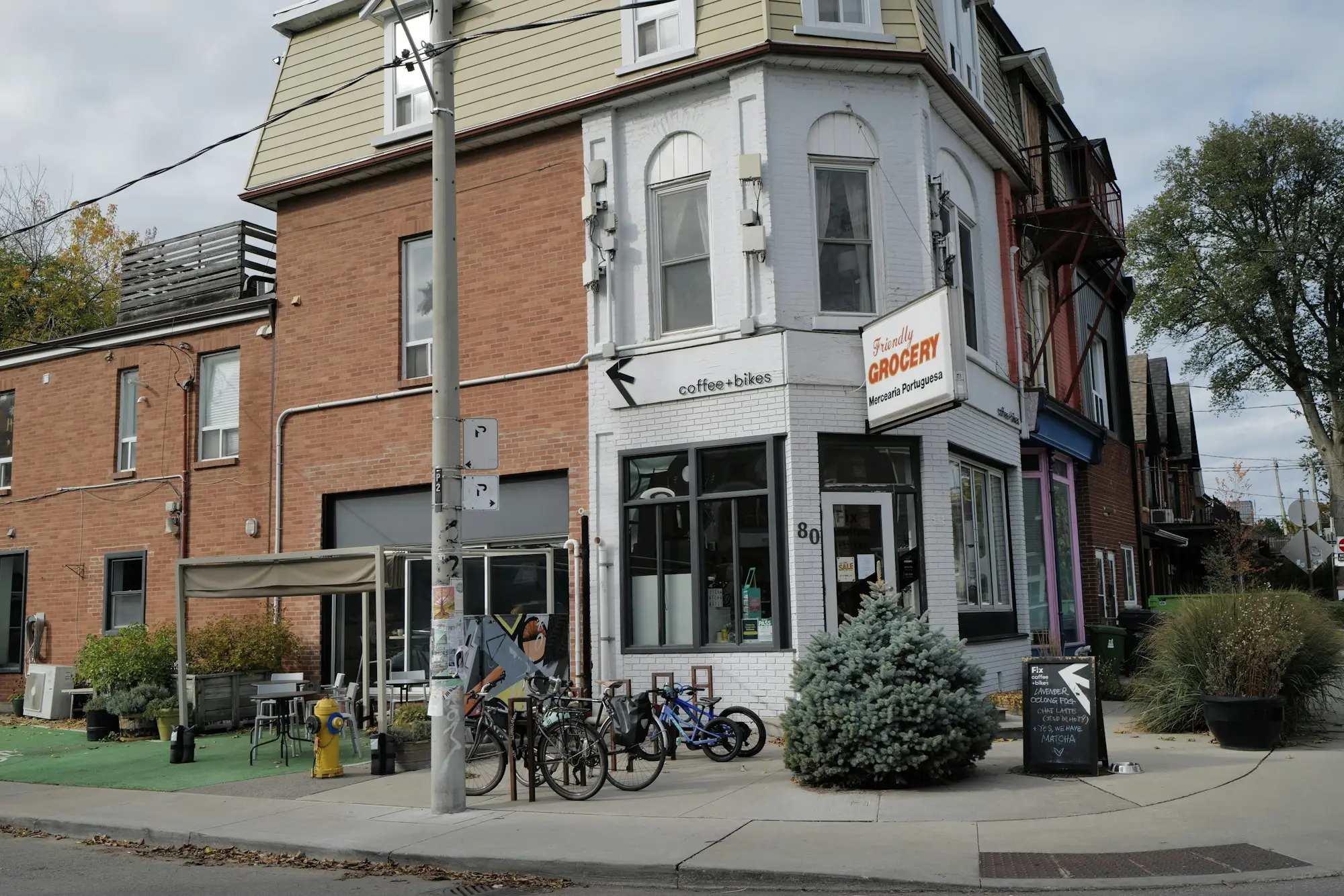 Corner shopfront with bicycles parked outside