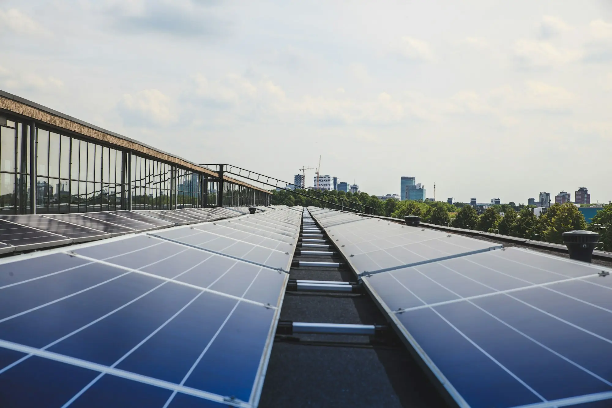 Close-up of rooftop solar panels catching the sun