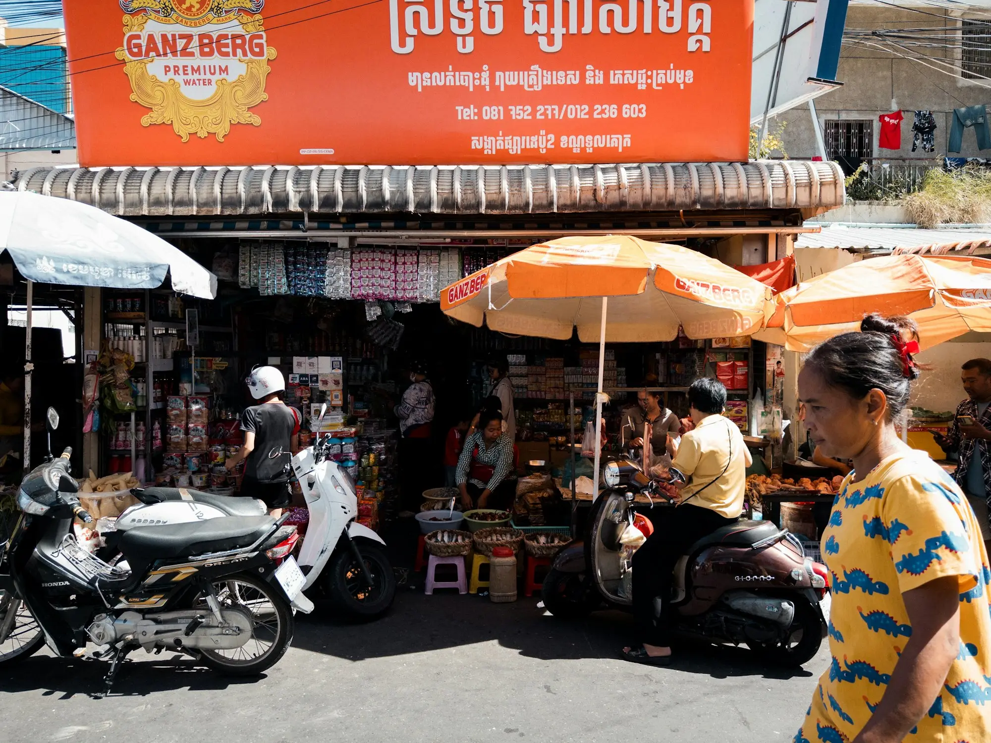 City street market stall with umbrellas